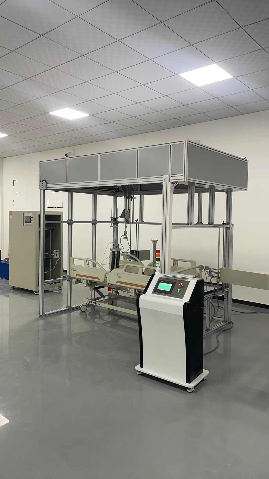 Static overload load testing on heavy duty steel hospital bed chassis in ISO certified laboratory