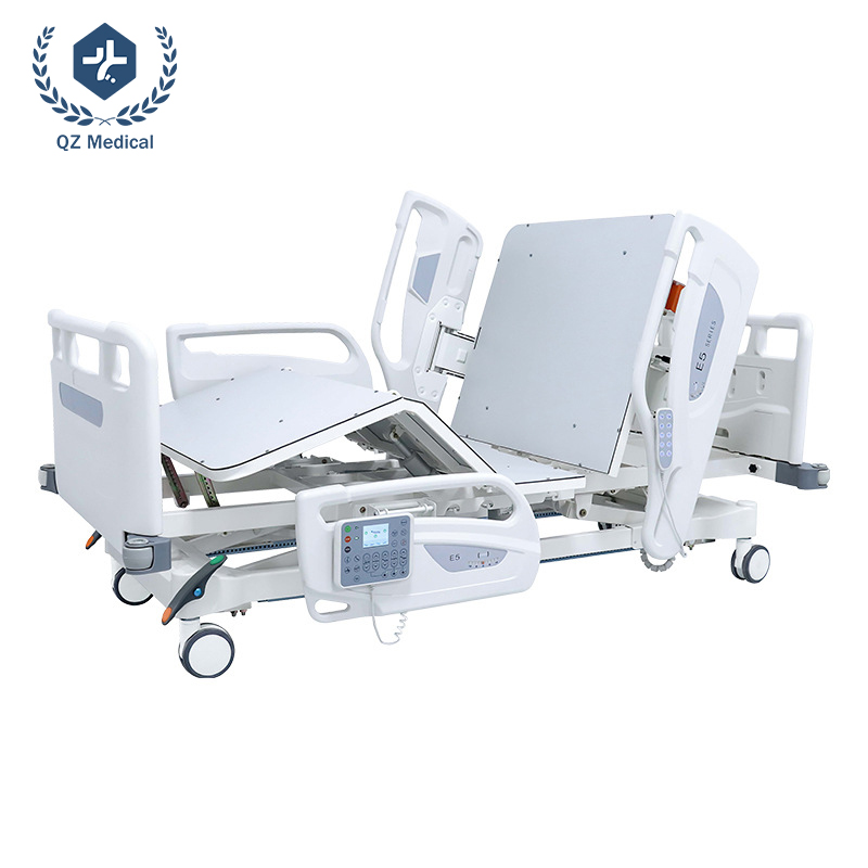 Heavy duty hospital bed elevated on bow shaped lifting columns with central brake casters